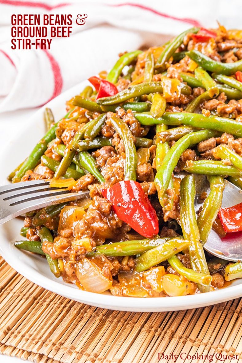 Ingredients to prepare green beans and ground beef stir-fry: green beans, ground beef, onion, garlic, red chilies, Shaoxing wine, soy sauce, oyster sauce, kecap manis (Indonesian sweet soy sauce), ketchup, sugar, ground pepper, tapioca starch, and water.